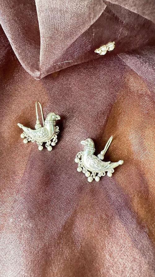 JHIMLI . Quirky parrot danglers in pure silver