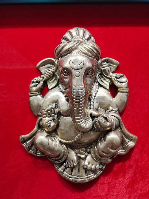 Pure Brass Ganesha with Bastar Idol framed beautifully by 35 small frames.