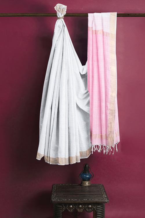 White Saree with pink Pallu and Goldan Zari Border