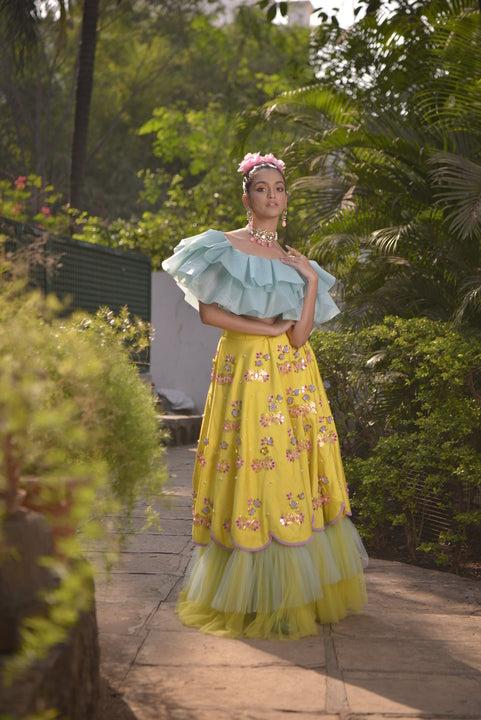 Yellow handwork  ruffle lehenga with pastel blue ruffle blouse