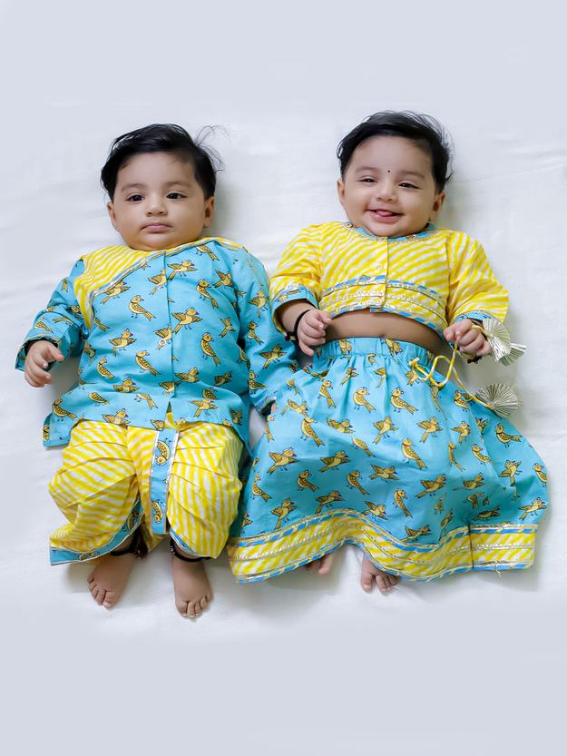 BownBee Chatty Parrot Dhoti Kurta & Sweet Talker Lehanga Choli Sibling Set -Yellow/Blue