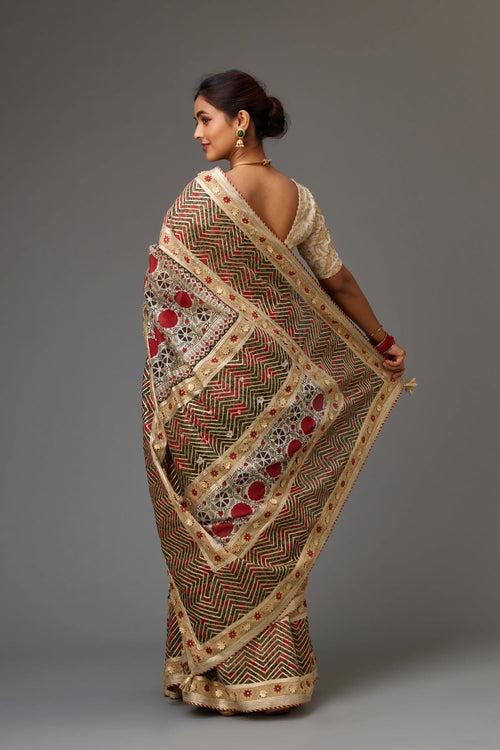 Silk chanderi red and off-white hand block printed saree set, Detailed with gota flowers and gold sequin work, paired with off white cotton chanderi fully embroidered choli.