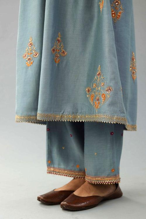 Light blue silk chanderi kurta-dress set with all-over zari, dori and contrast silk thread embroidery, highlighted with gold sequins work.