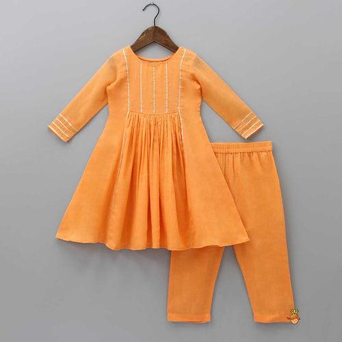 Beads Adorned Orange Kurti And Pant With Dupatta