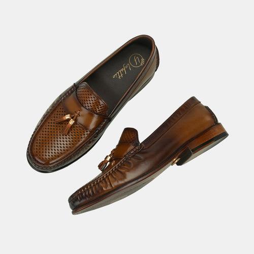 Tan Perforated Tassel Loafers by Lafattio