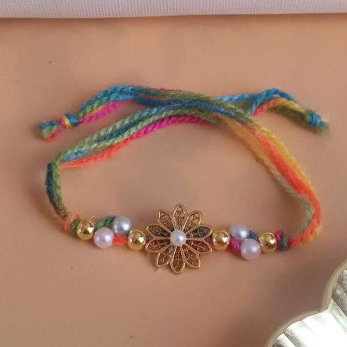 Floral Design Rakhi With Pearl