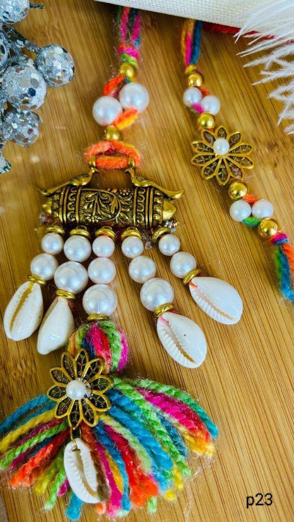 Pearl & Cowrie Shells Work Pair Rakhi