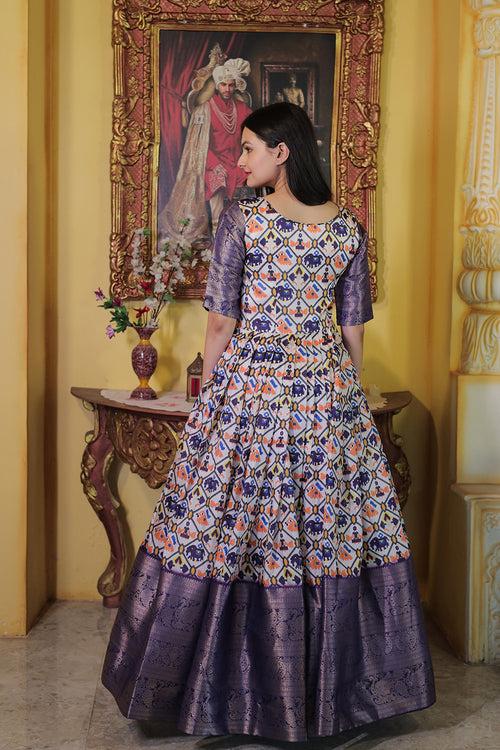 Latest Purple Soft Silk With Patola Printed Gown