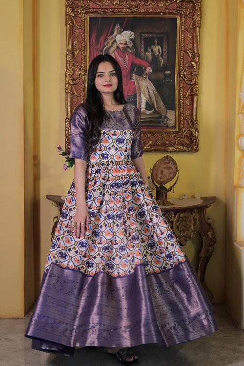 Latest Purple Soft Silk With Patola Printed Gown