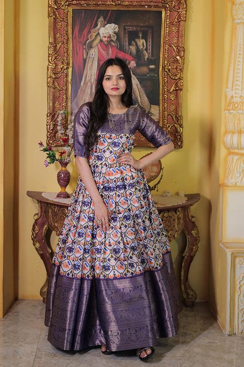 Latest Purple Soft Silk With Patola Printed Gown