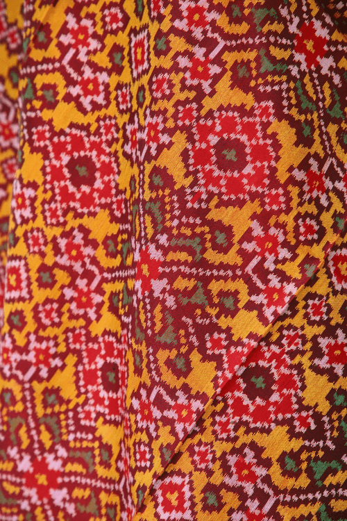 Semi double ikat dupatta in Red and Yellow colour with traditional Navratna design