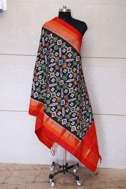 Single ikat dupatta in traditional Manekchowk design with Red and Black combination