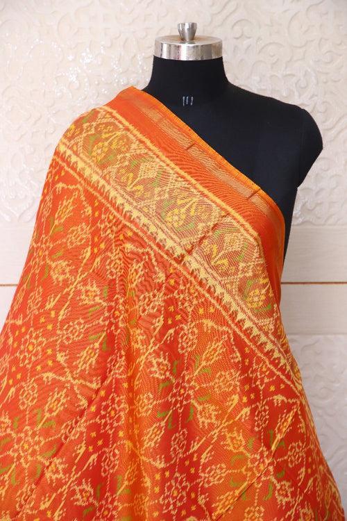 Traditional Chhabadi bhat design in rust yellow colour