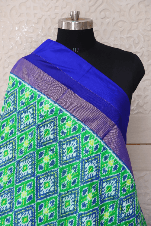 Single ikat dupatta in traditional Paan Chanda design in Parrot Green and Blue colour