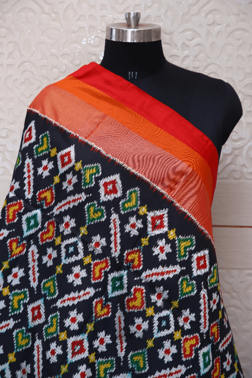 Single ikat dupatta in traditional Manekchowk design with Red and Black combination