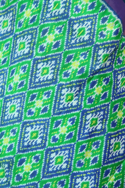 Single ikat dupatta in traditional Paan Chanda design in Parrot Green and Blue colour