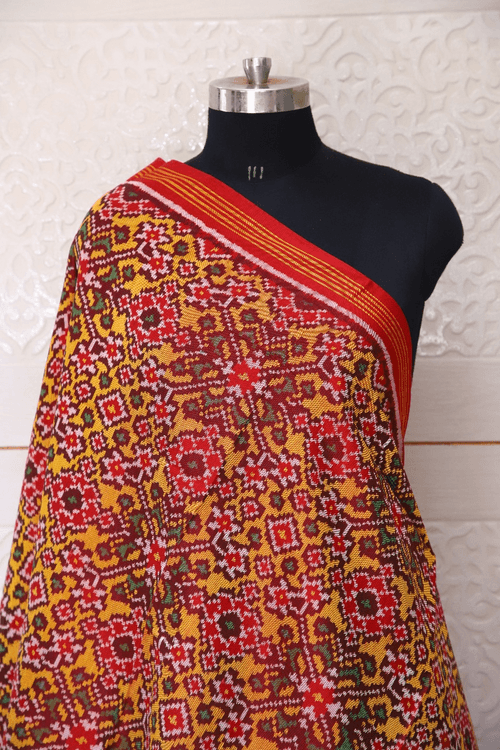 Semi double ikat dupatta in Red and Yellow colour with traditional Navratna design