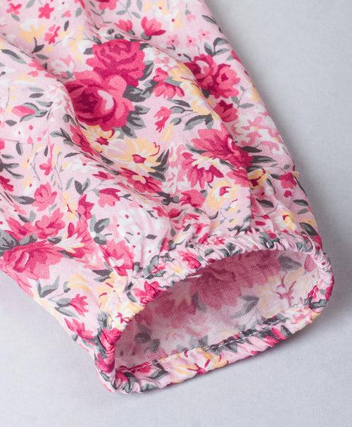 Pink Floral top with frills on the shoulder