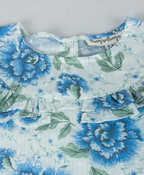 BLUE FLORAL PRINT TOP WITH FRILLS ALONG YOKE