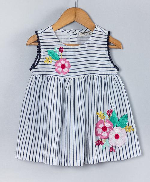 BLACK AND WHITE STRIPED PRINT TOP WITH FLOWER EMBROIDERY