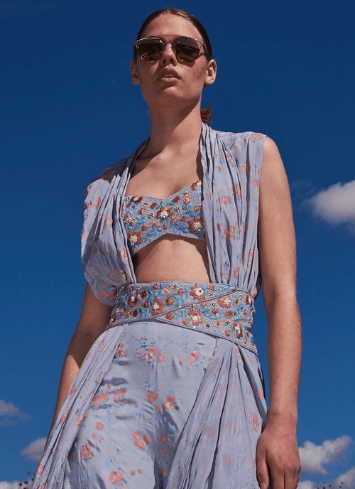 Periwinkle blue cracker printed throw with printed pants and embroidered bustier and belt