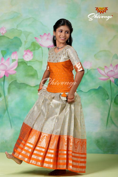 Silver Fog Girls Pattu Pavadai Designs in Orange