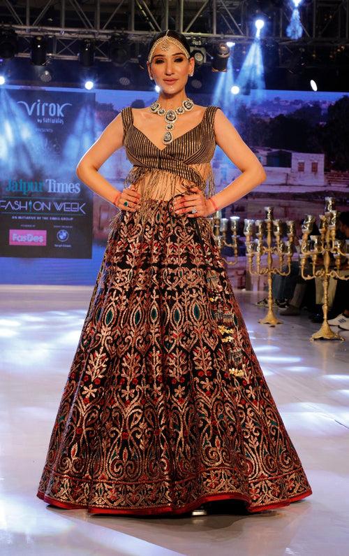 Black and Gold Lehenga with a Cut Out Fringe Blouse.