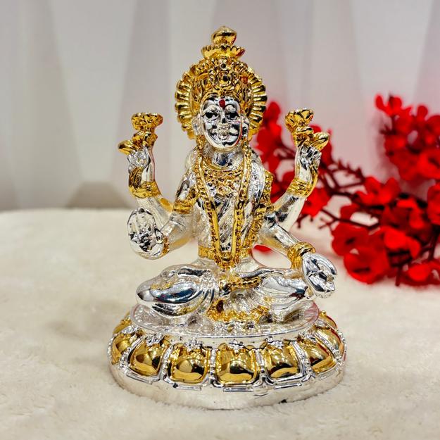 Antique Silver Lakshmi Idol. Coated with 24 carat gold and silver.