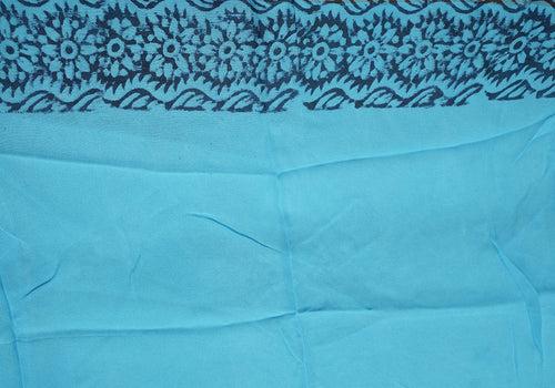 White and Turquoise Blue Block Printed Georgette Saree