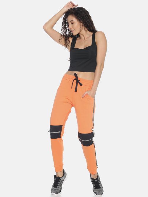 Women Slim Fit Solid Joggers with Side Tape & knee zipper