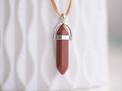 Gold Sandstone Wand Pendant: Radiate Confidence and Vitality