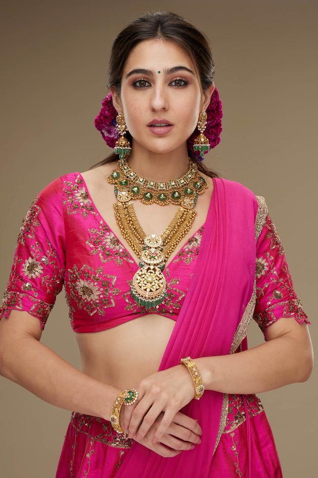 Sara Ali Khan in Fuchsia Pink Hand Embroidered Raw Silk Lehenga Set