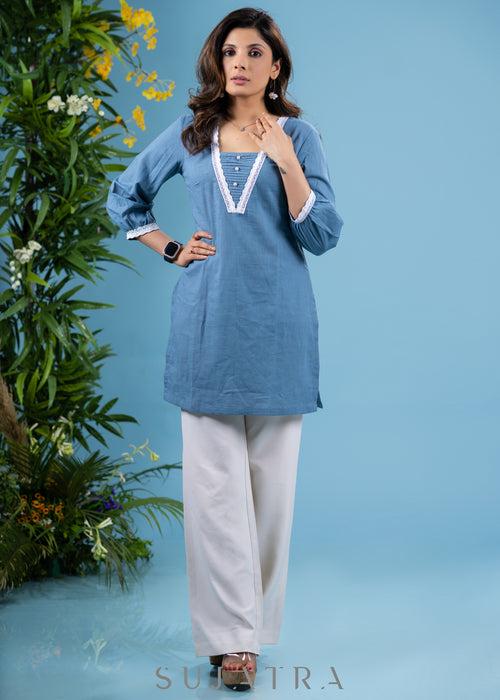 Trendy powder blue cotton tunic highlighted with elegant laces