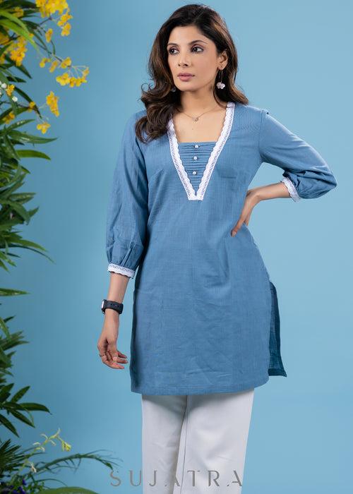 Trendy powder blue cotton tunic highlighted with elegant laces