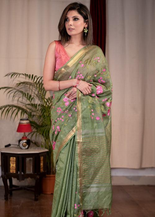 Exclusive embroidered olive green pure linen saree