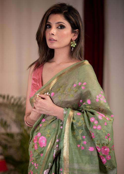 Exclusive embroidered olive green pure linen saree