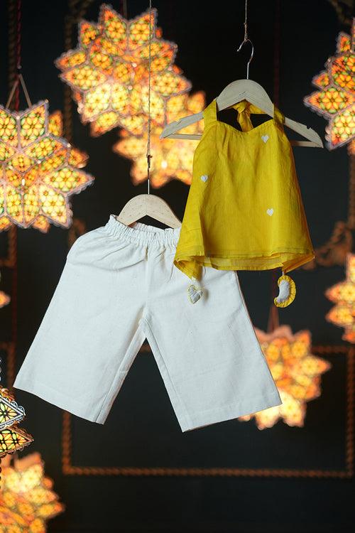 Basant girls ethnic wear halter set with yellow halter neck top and comfortable white pants