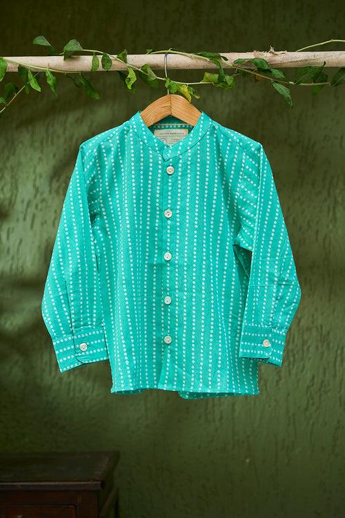 ‘Barefoot Boy’ mandarin collar hand block printed malmal cotton unisex full sleeve summer shirt in blue with white polka dots for boys and girls