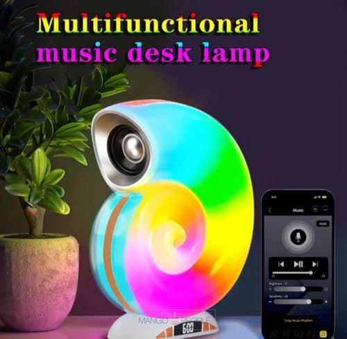 PORTABLE WIRELESS CONCH SHAPE MUSIC SPEAKER LAMP WITH CLOCK
