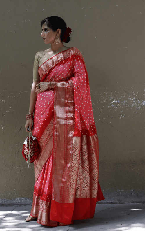 Buy Bandhani Designer Saree Online : Peach Red Bandhani Hand Dyed Saree With Gold Border