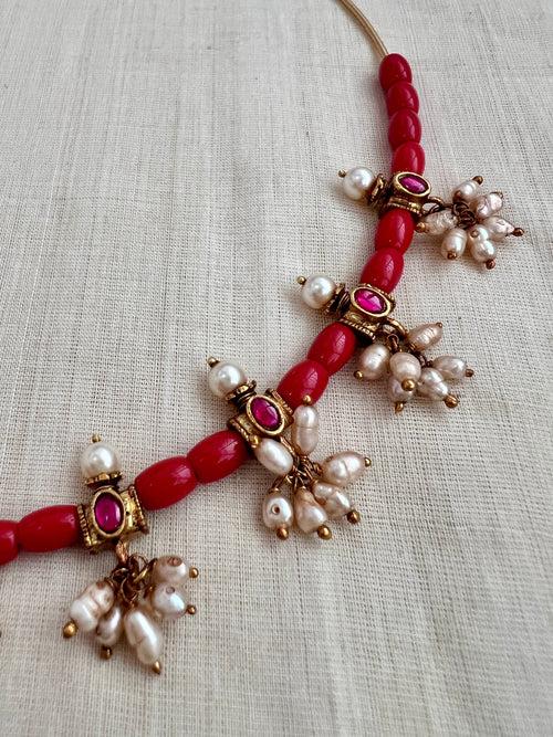 Gold polish coral beads & kundan motifs in a hasli chain