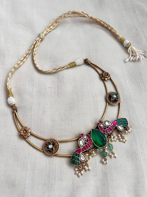 Gold polish hasli with kundan, ruby and emerald motifs and pearls