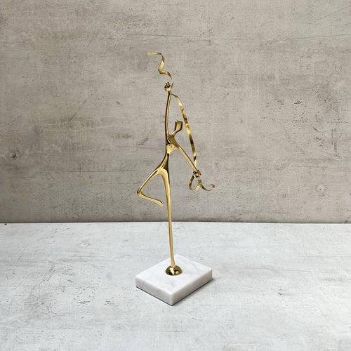 Golden Harmony Brass Sculpture