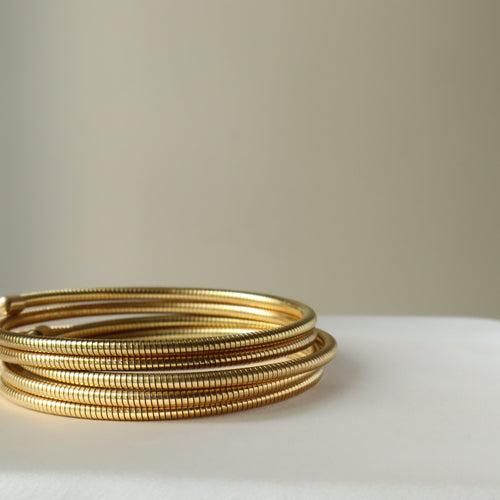 Sleek Spiral 18K Gold Plated Bangle