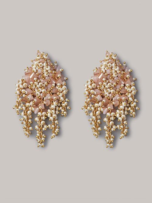 Pink And Gold Earrings On Golden Base