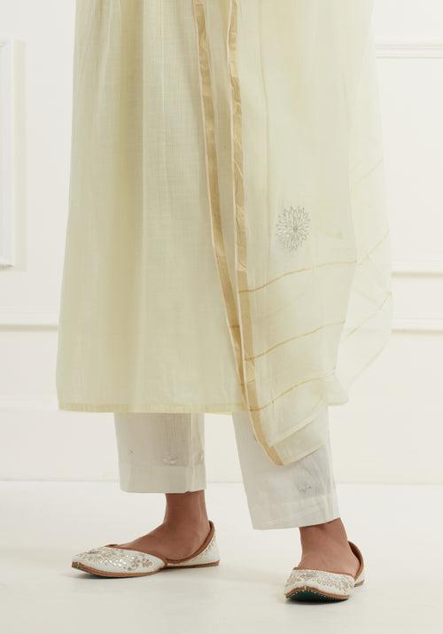 Lemon yellow slub kurta with pleates and pittan flower embroidery yoke details paired with straight pants and chanderi dupatta with pittan flower embroidery