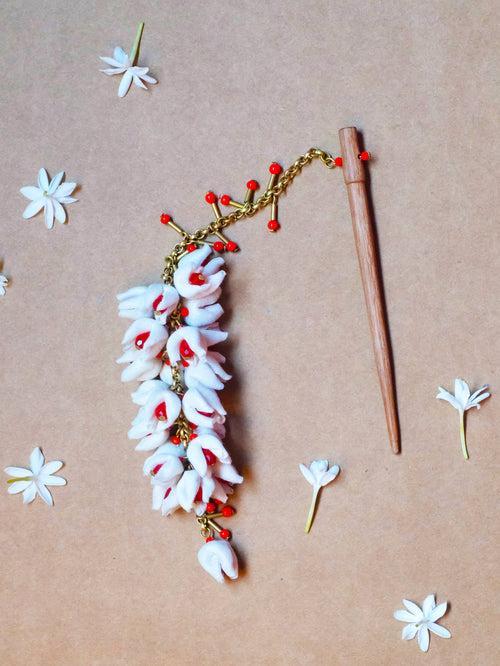 White mogra with red beads hair ornament