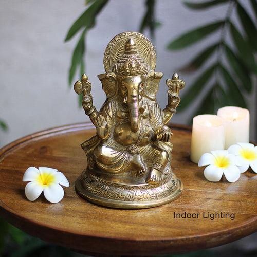 Brass Sitting Ganesha on Round Base