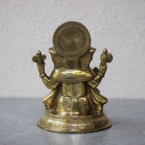 Brass Sitting Ganesha on Round Base