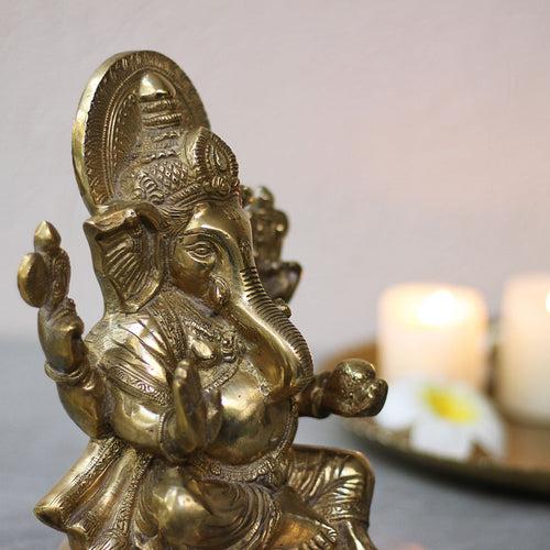 Brass Sitting Ganesha on Round Base